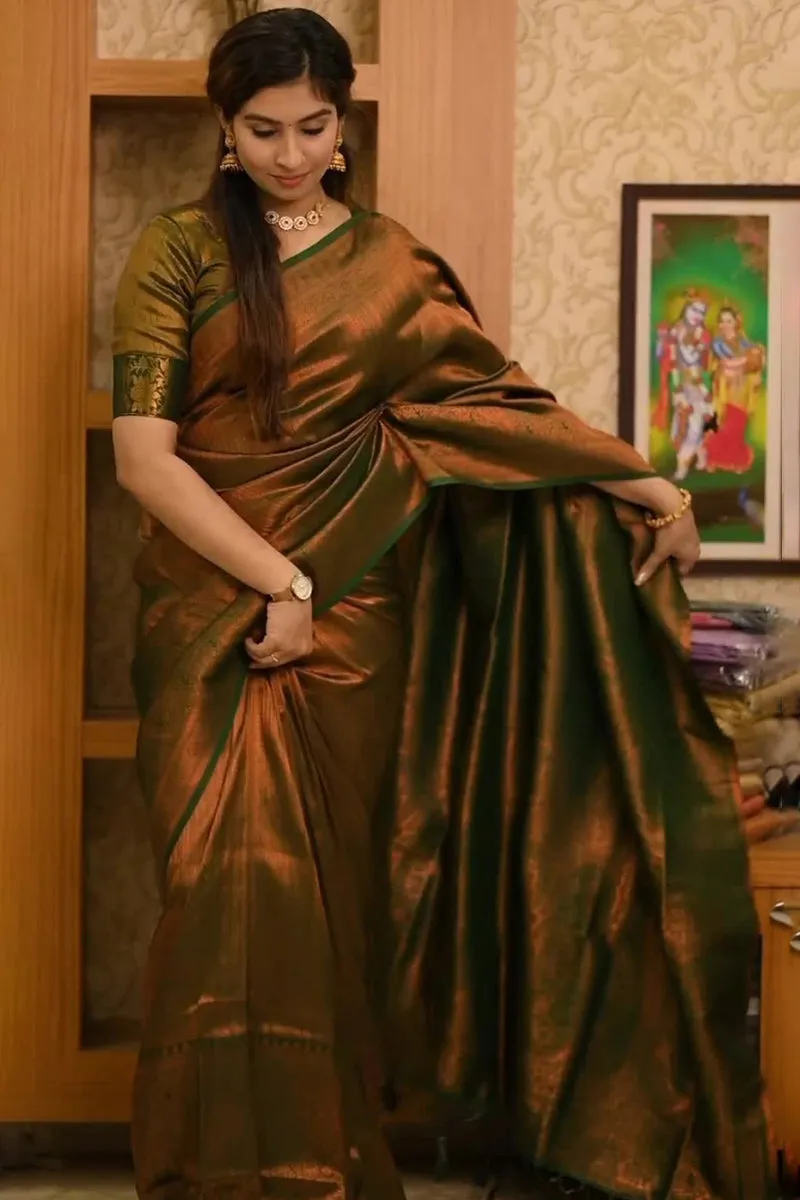 Wonderful Dark Green Soft Silk Saree With Devastating Blouse Piece